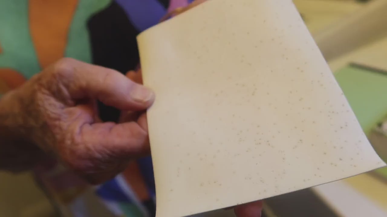 Close-up of Morning Rain laundry sheet visible enzyme particles video
